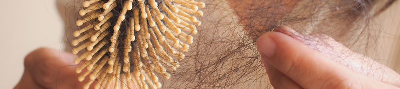 there are a few ways to reduce or stop hair loss naturally